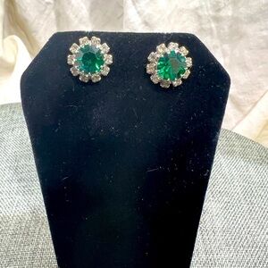 Emeralds with CZ Diamonds Casing Inlayed in Sterling Sliver settings. Amazing.